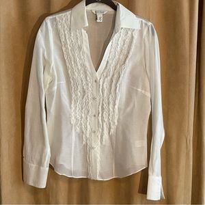 White House Black Market blouse. Ruffles, pretty buttons, fitted silhouette.